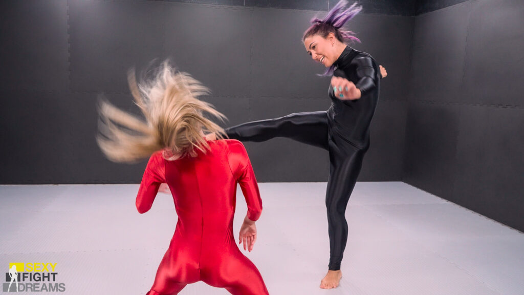SFD805 Marzia vs Sabrina – Glossy catsuits frame a nonstop barrage of neck snaps, kicks and strikes